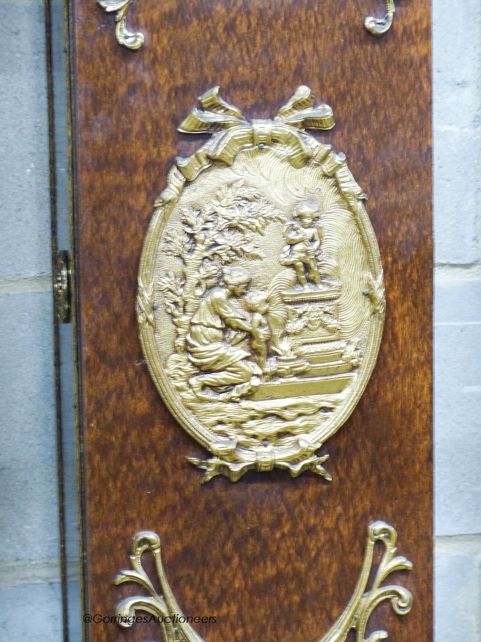 A reproduction gilt metal mounted longcase clock, height 184cm